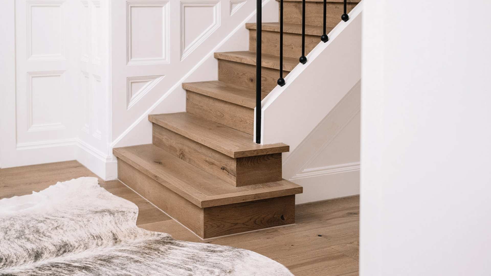 Project Profile | Hampden Road hero | Interior timber flooring showcased on bottom of stairway