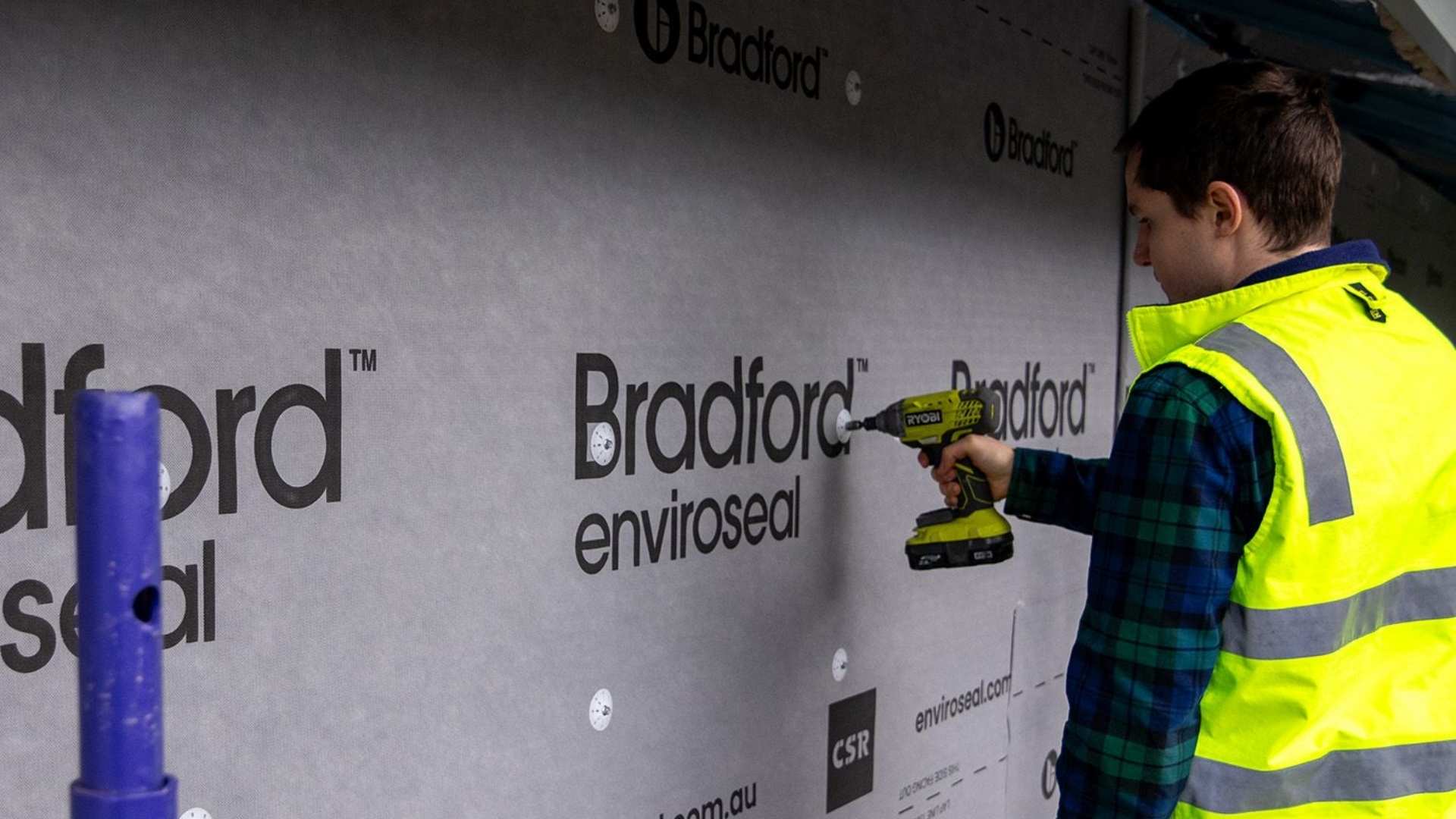 Bradford breathable wall wrap being installed by trade.