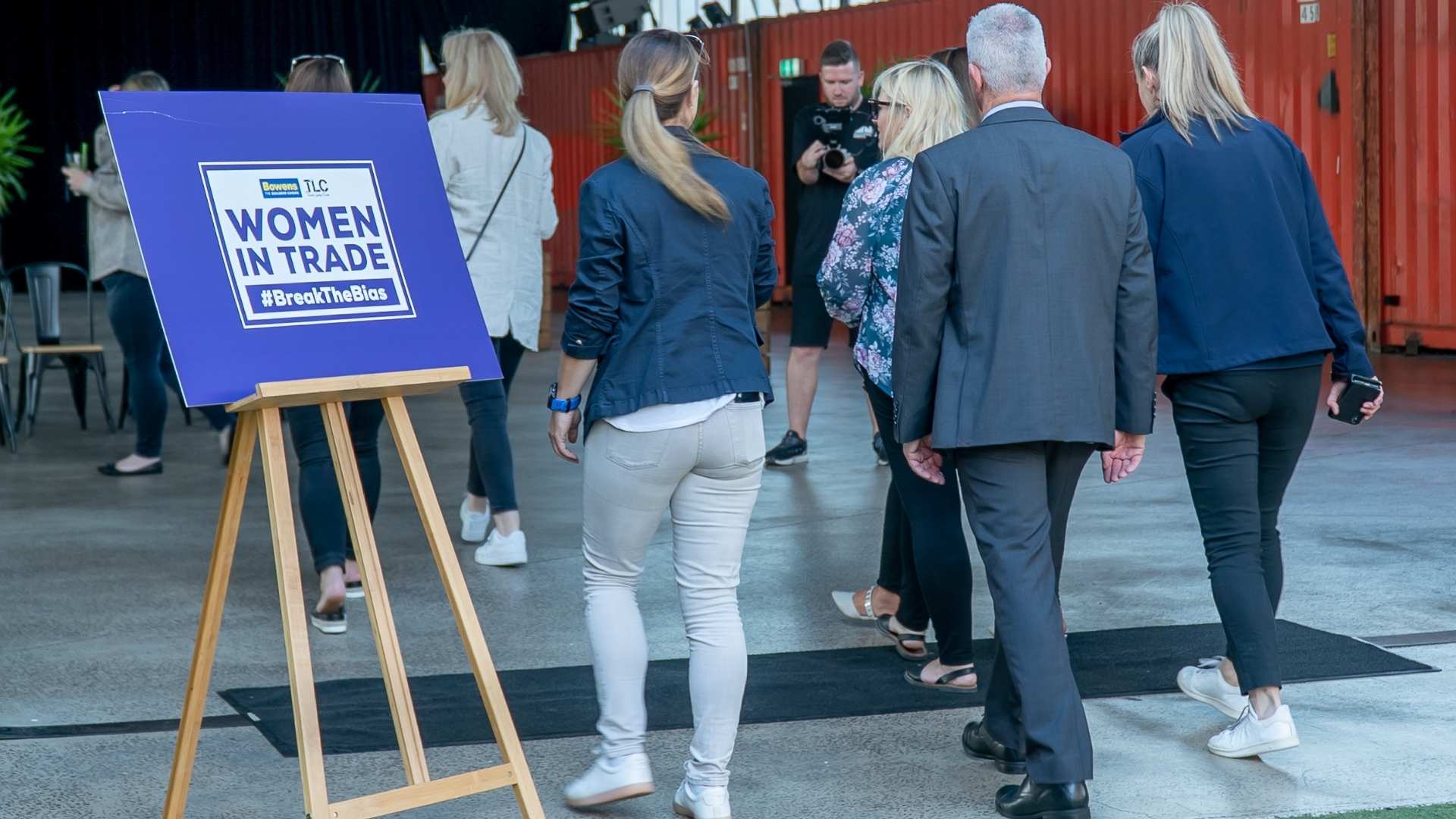 attendees walking into women in trade awards ceremony.