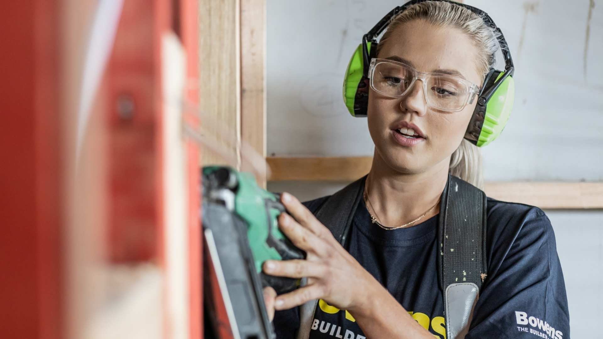 Women in Trade ambassador Bardie Somerville shooting stud with framing gun