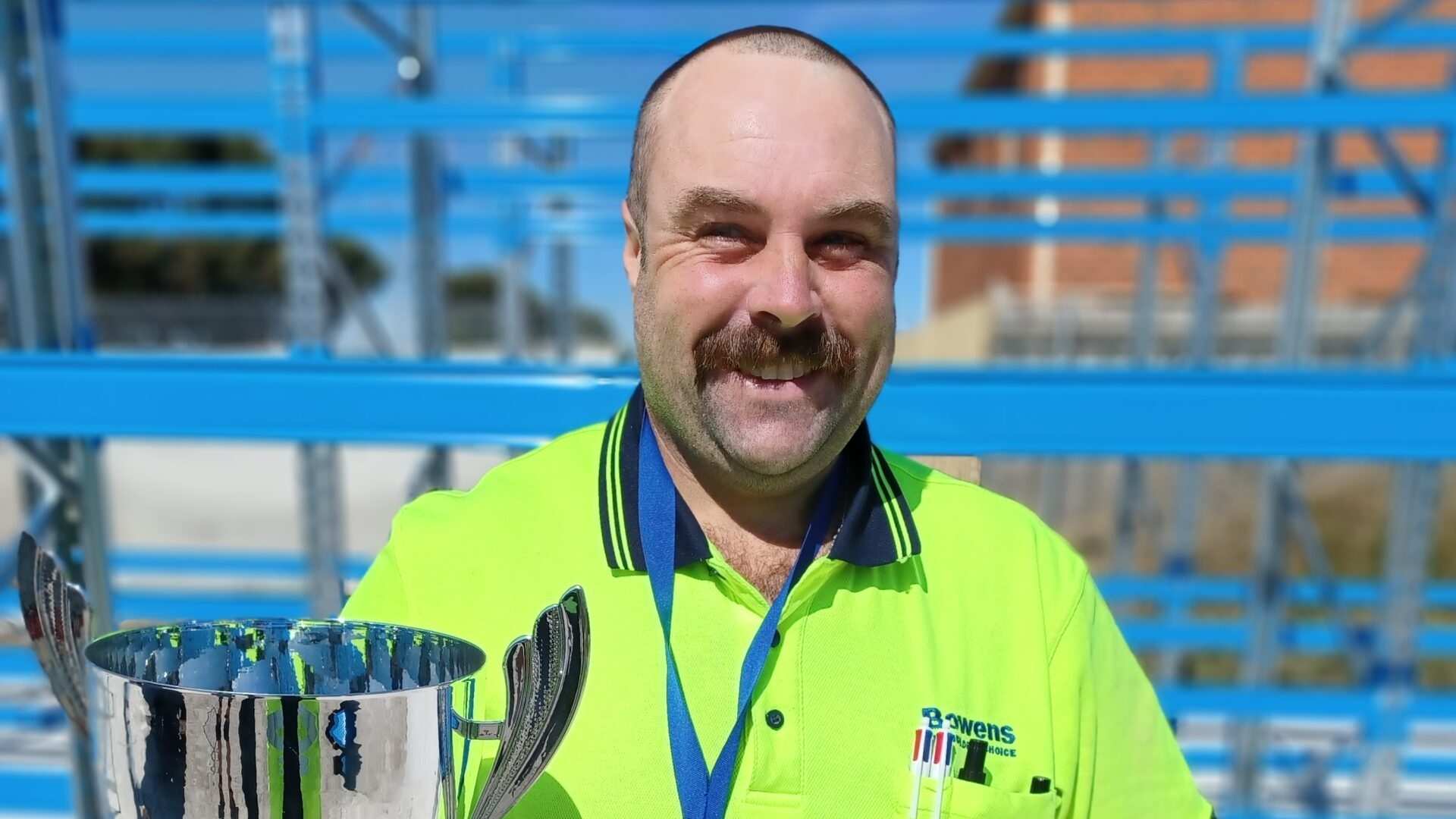 trevor millson winning an award on site