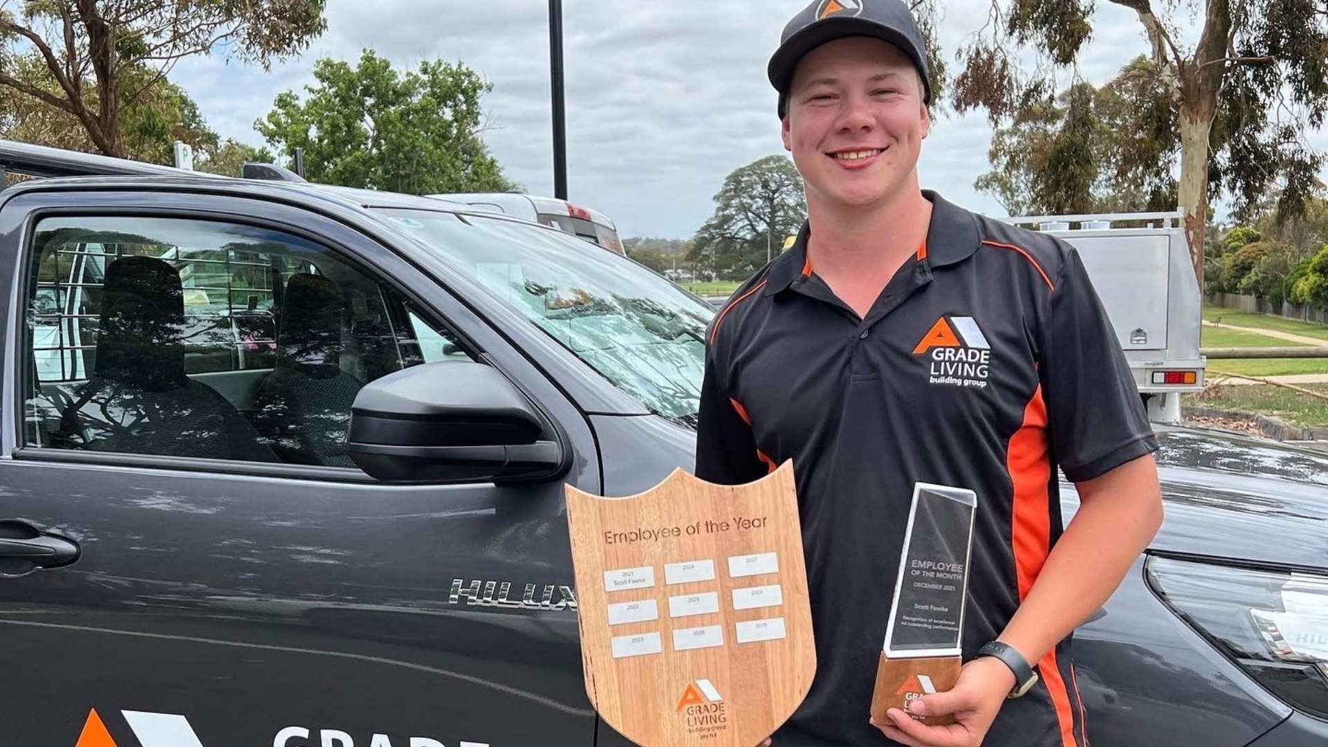 a grade living employee winning employee of the year