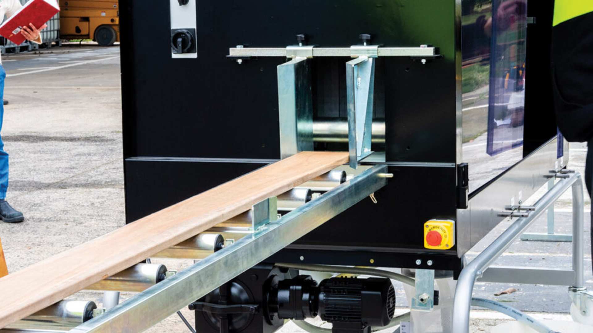 Pre-coating machine in operation.