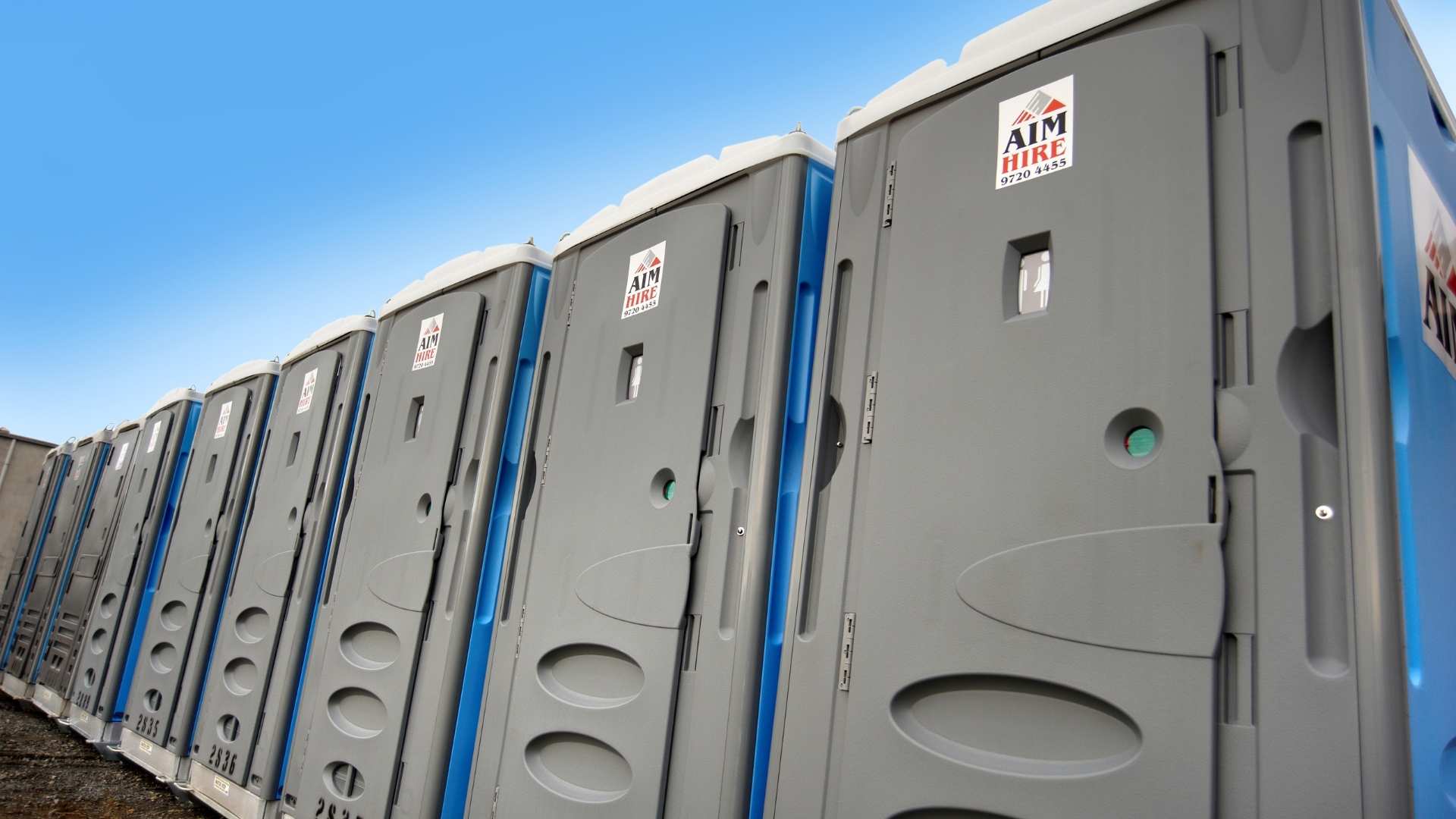 Row of portable toilets.