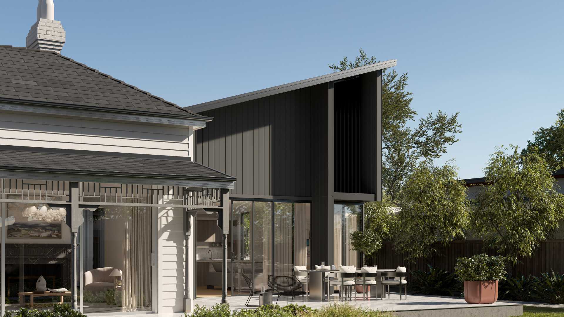 A modern heritage house extension with horizontal wood cladding.