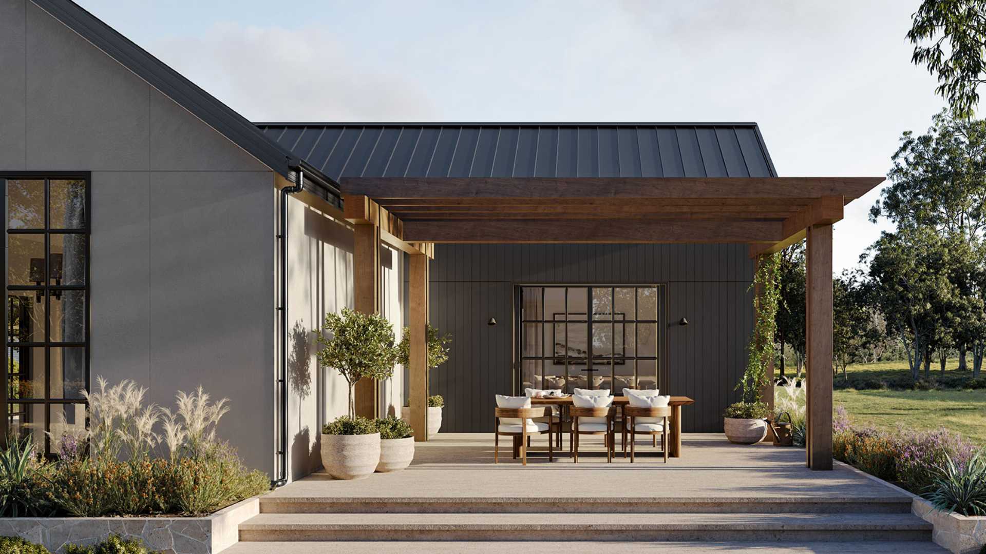 Modern farmhouse with covered patio and dining area - a seamless blend of traditional and contemporary design elements