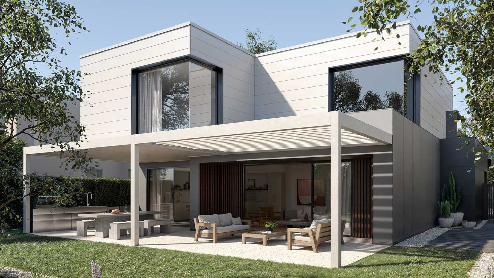 A modern home with a covered patio and porch, showcasing clean lines and contemporary design elements.