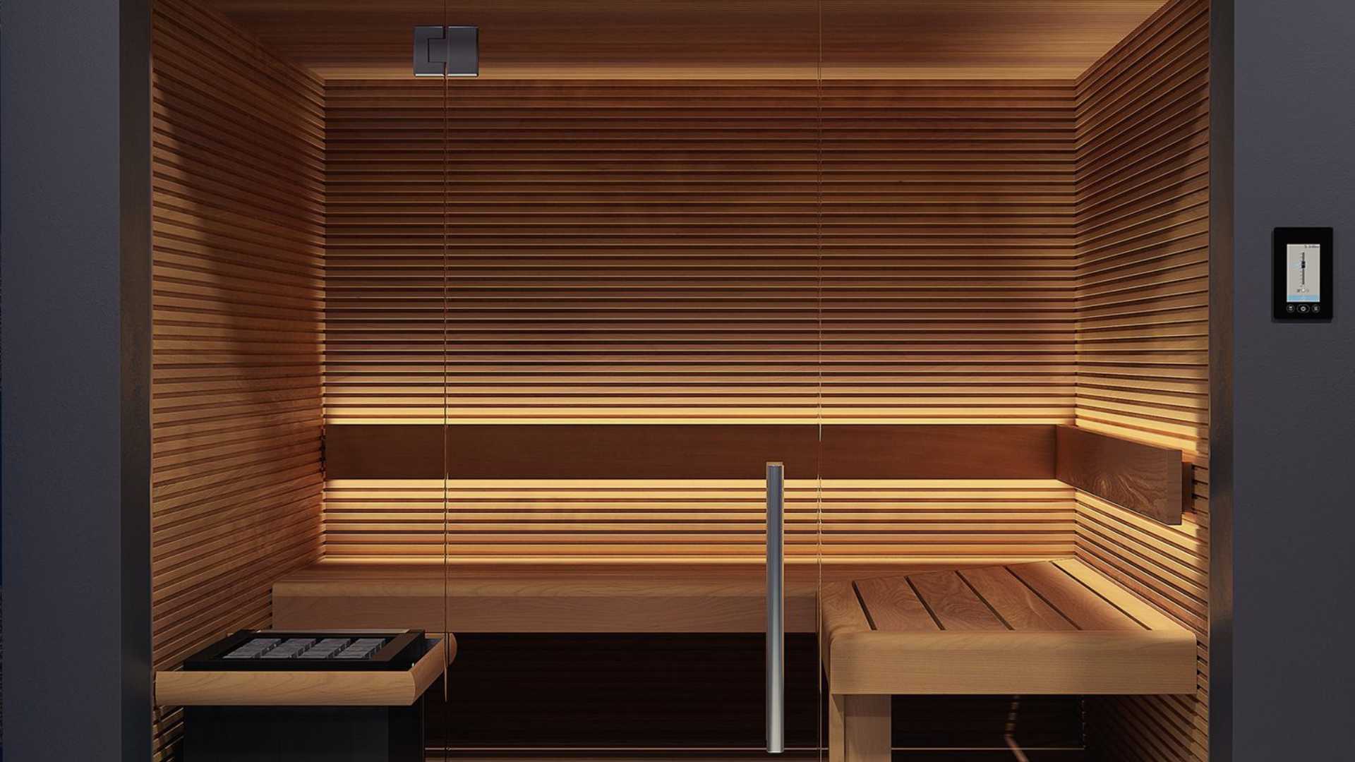 Interior of a modern sauna with wooden walls and floor, featuring Thermory® Motion & Thermo interior wall lining.