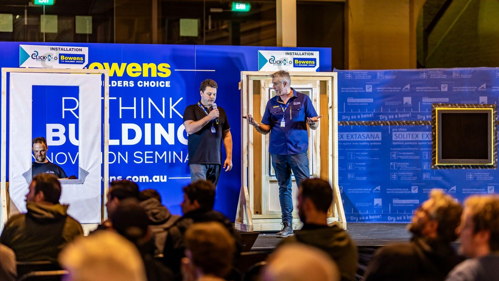 two men on stage at the innovation area
