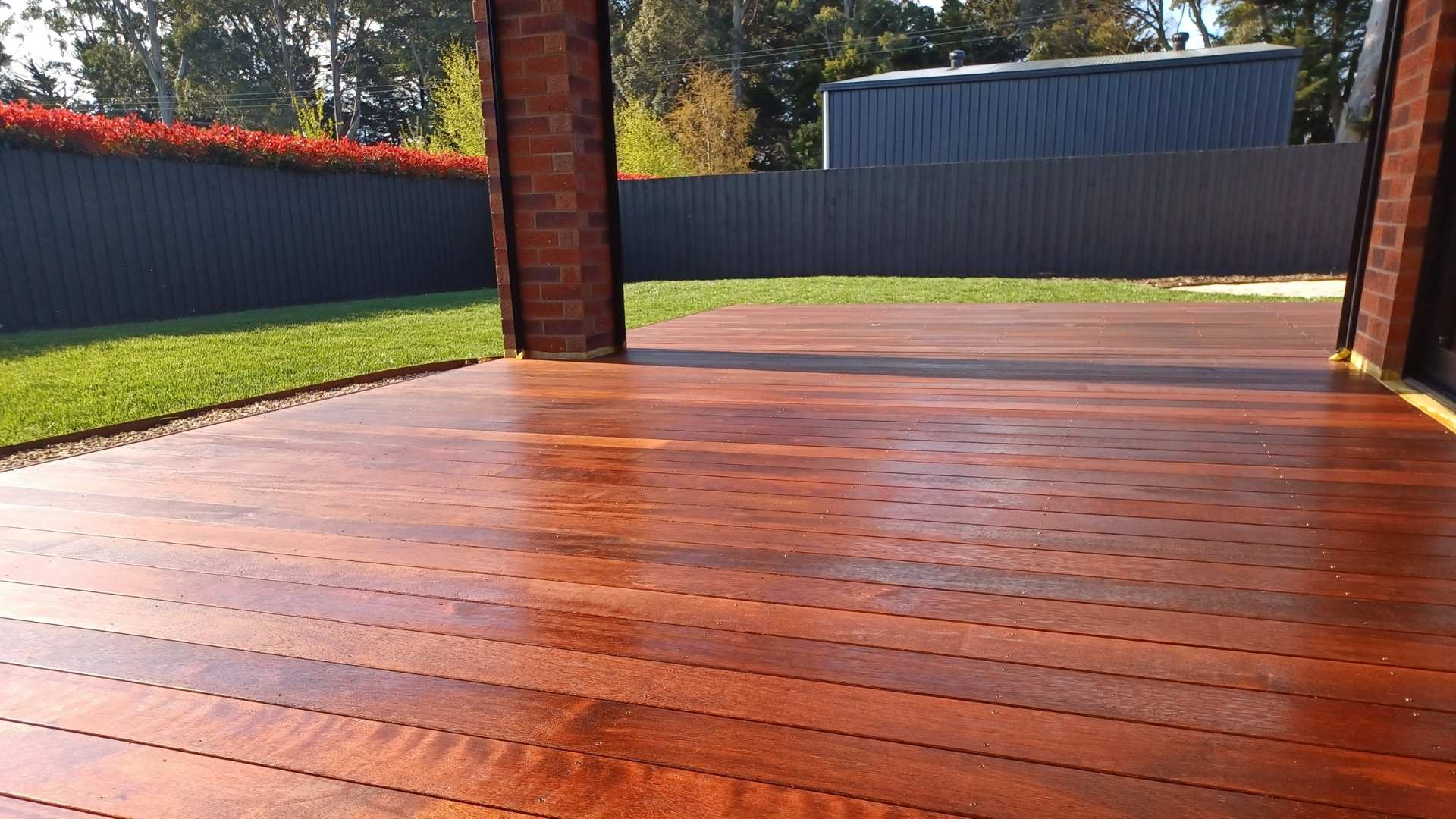 Merbau decking completed in backyard setting.