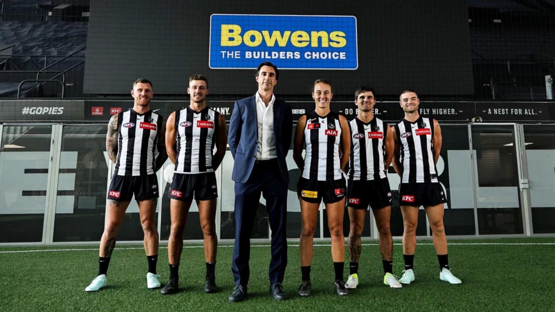 Andy Bowen, Director, pictured with Collingwood AFL and AFLW players marking Bowens as a Major Partner of the club.