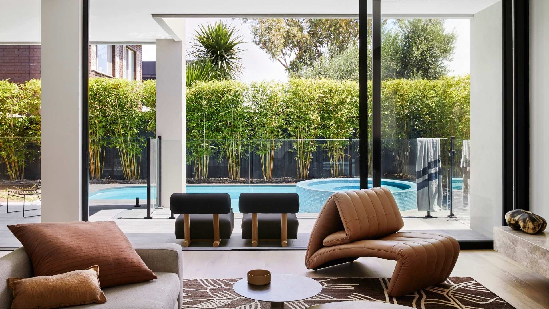 View of the pool area from the perspective of the living space at Englehart Homes Templestowe project.