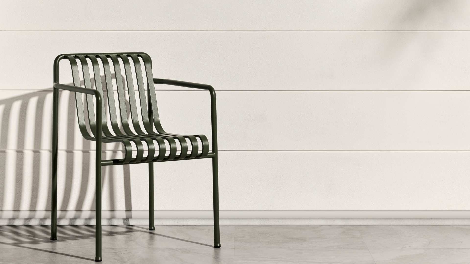 Close up of James Hardie Stria Fine Texture Cladding with chair.