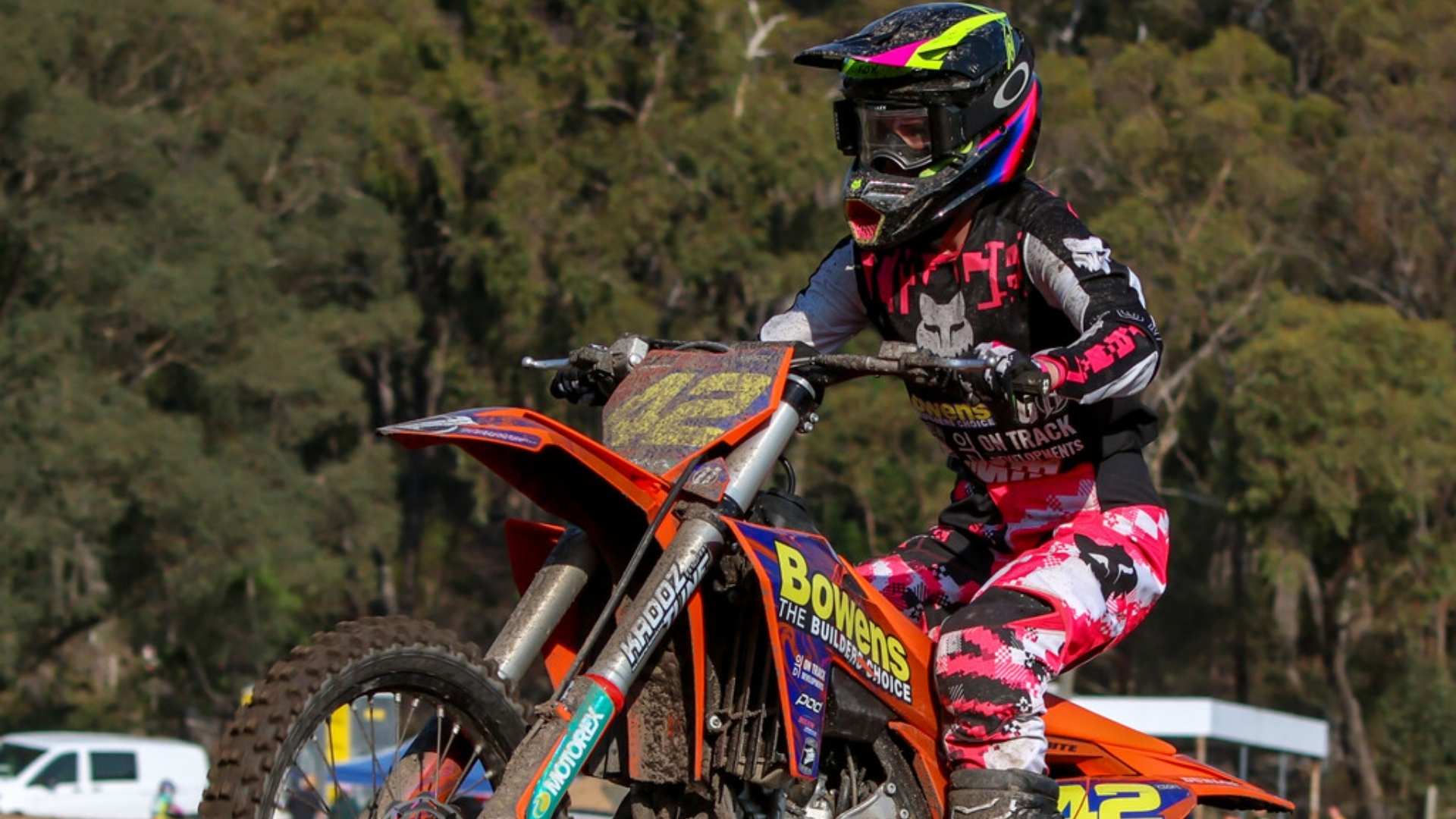 Clea White on her Bowens sponsored dirt bike for a motocross race.