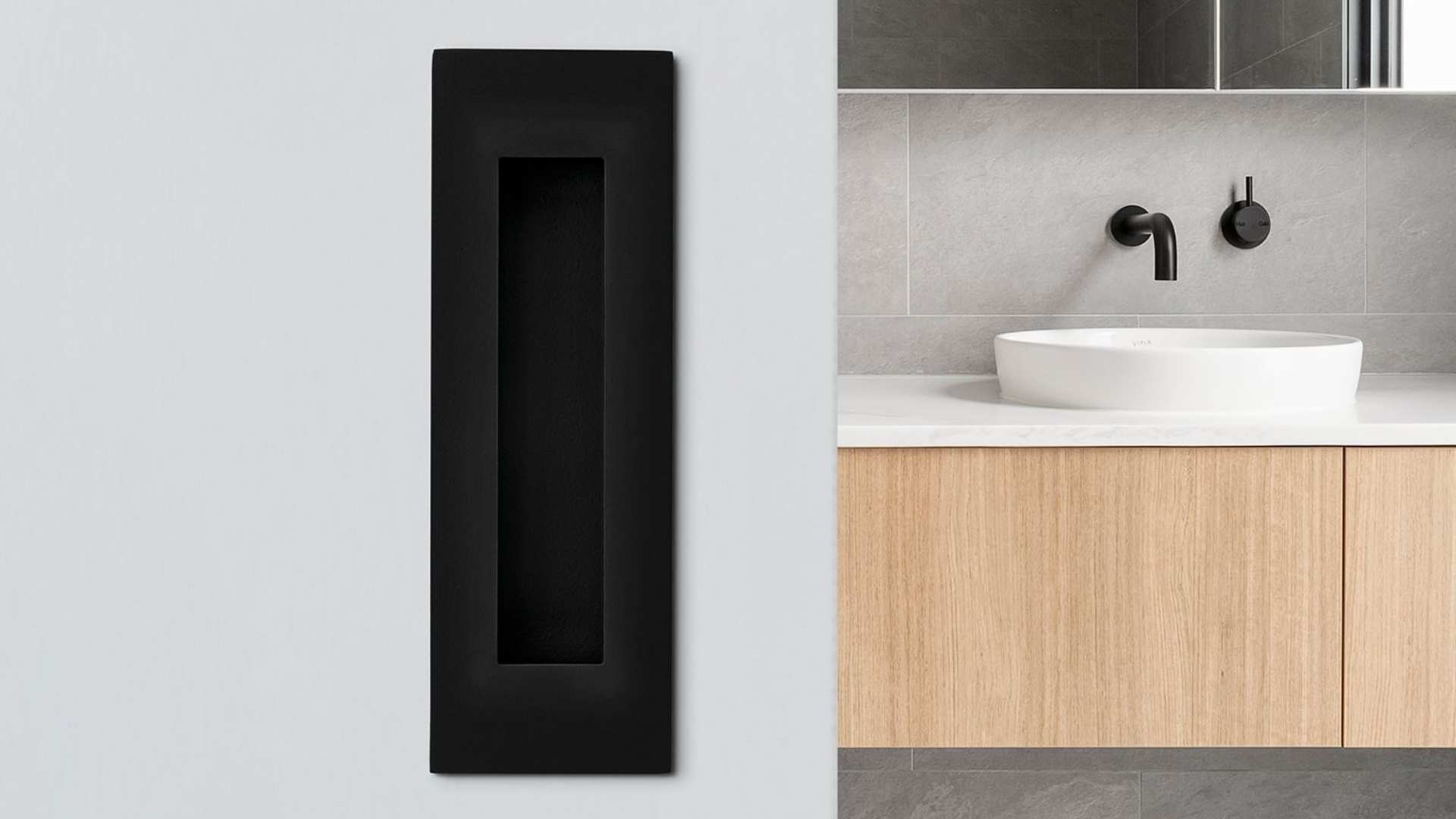 Lockwood flush pull door handle in matte black finish.
