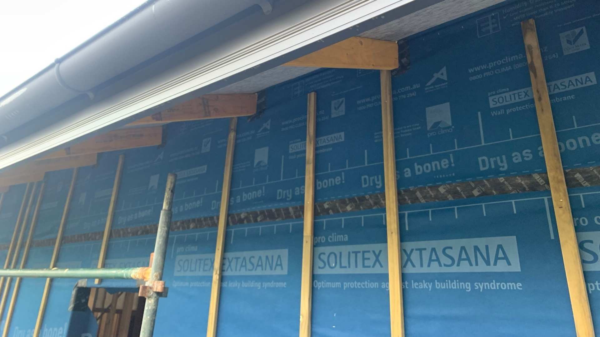Pro Clima membrane wall wrap used on job.