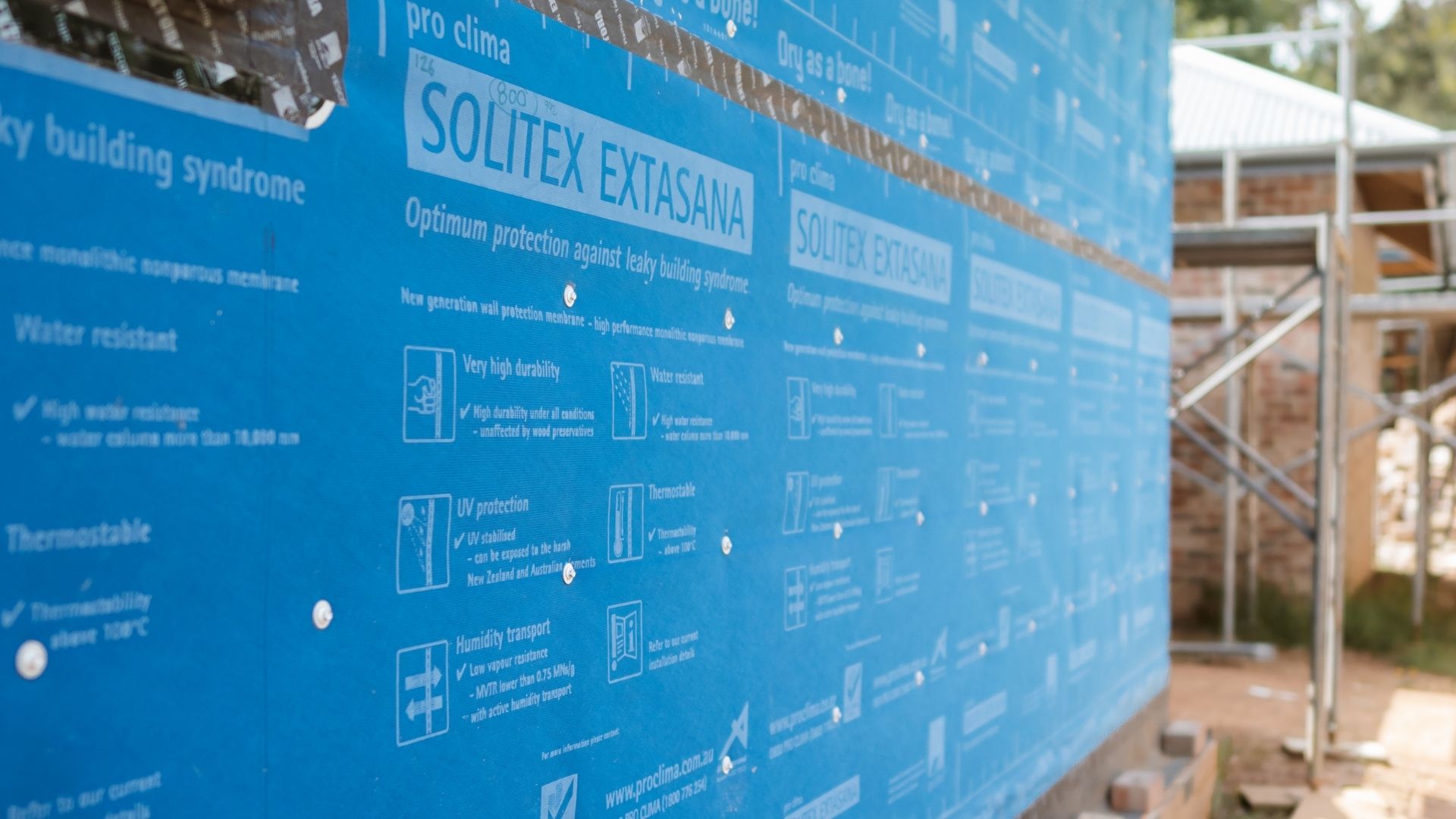 Close up of Pro Clima wall wrap on house.