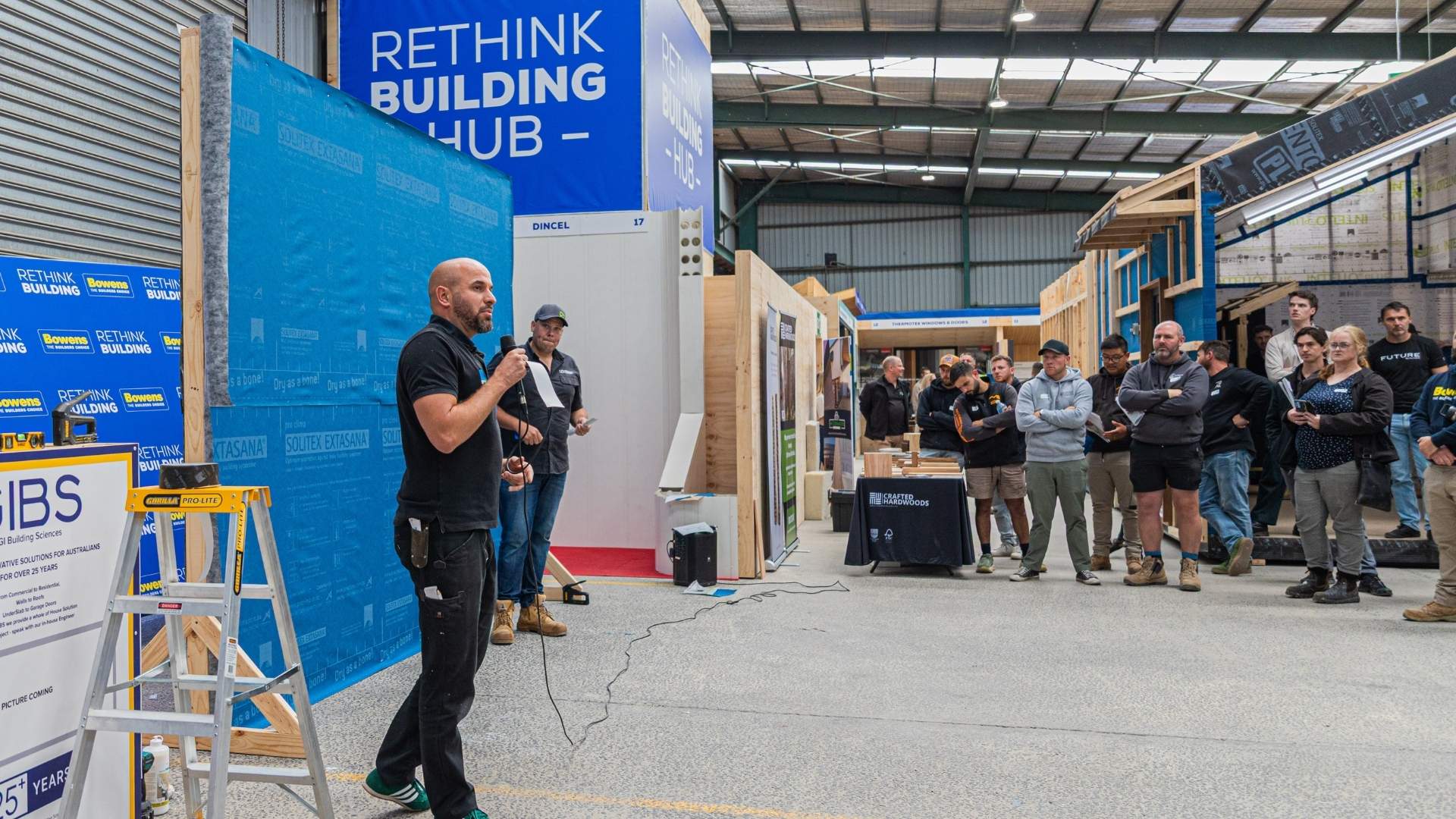 Builders listening during the hands-on demonstration at Rethink Building Summit 2025.