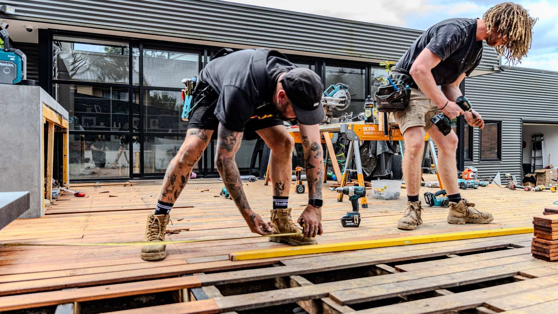 Builders installing Mebrau decking.