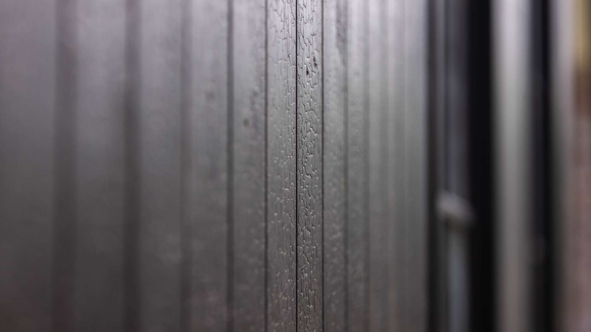 Close up shot of timber cladding in bush fire zone.