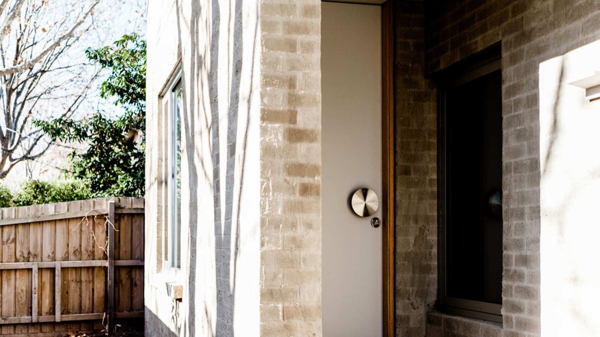 Round entry door furniture on residential build.