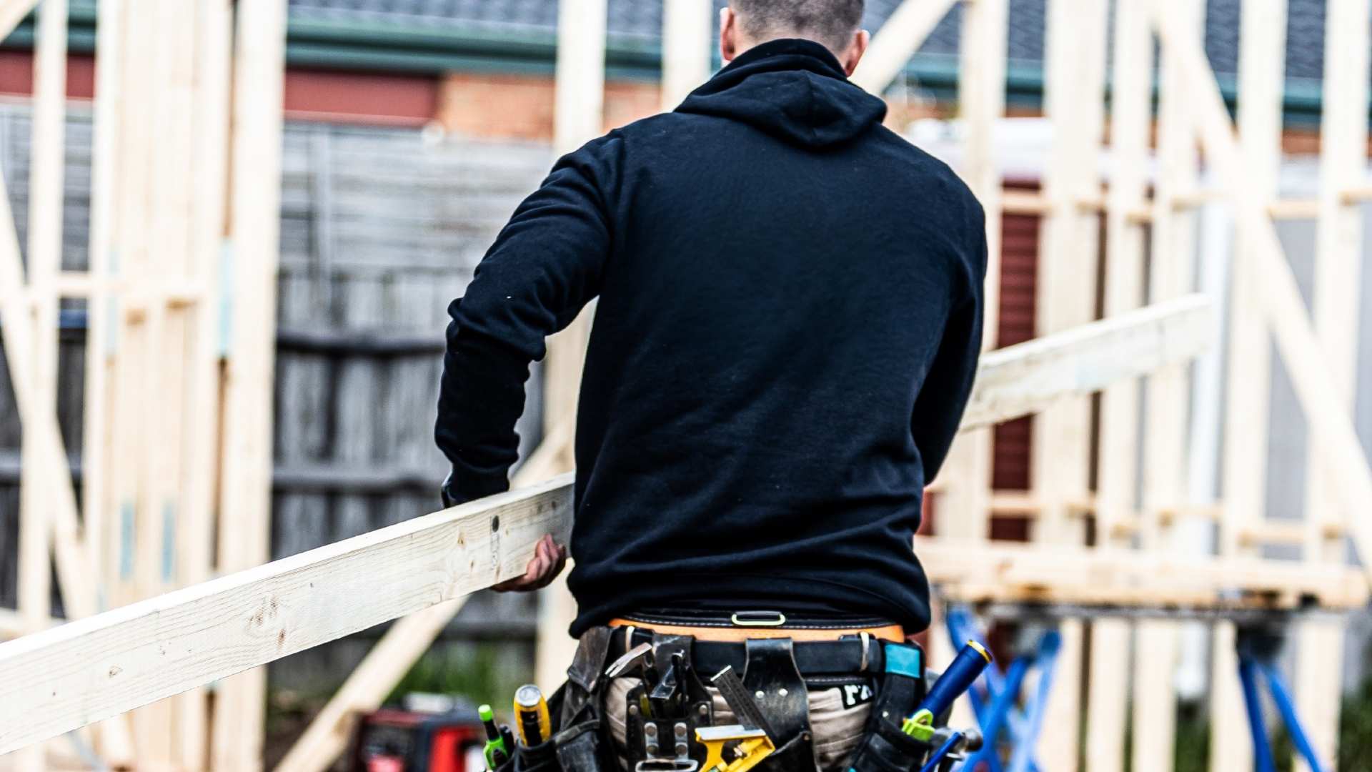 Trade carrying high quality Bowens timber on site.